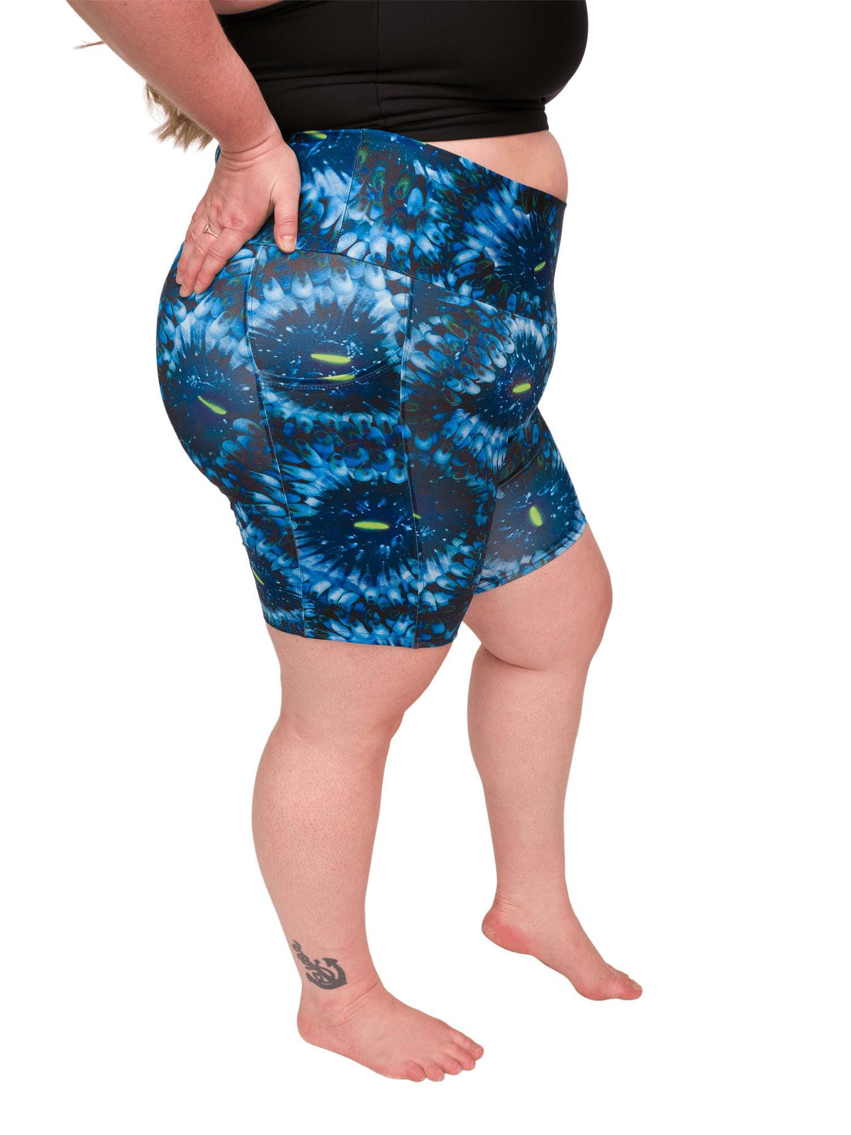 Model: Chelsea is a marine conservationist who believes that science is for everybody… and every BODY! She is 5&#39;2&quot;, 230 lbs, 40DD and is wearing 3XL shorts.