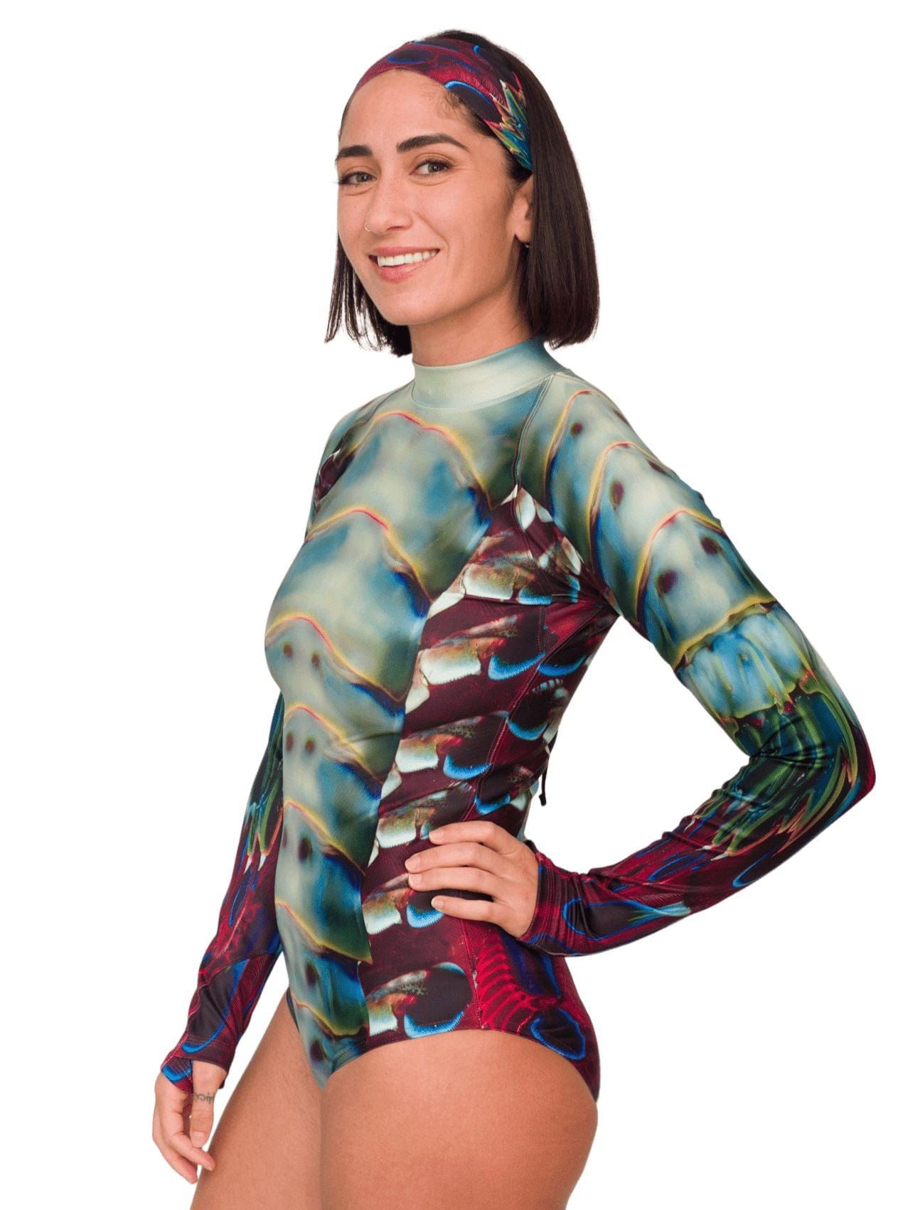 Model: Shireen is an underwater photographer, filmmaker, and scientist. She is 5'7", 145lbs, and wearing a size M Sun Suit.