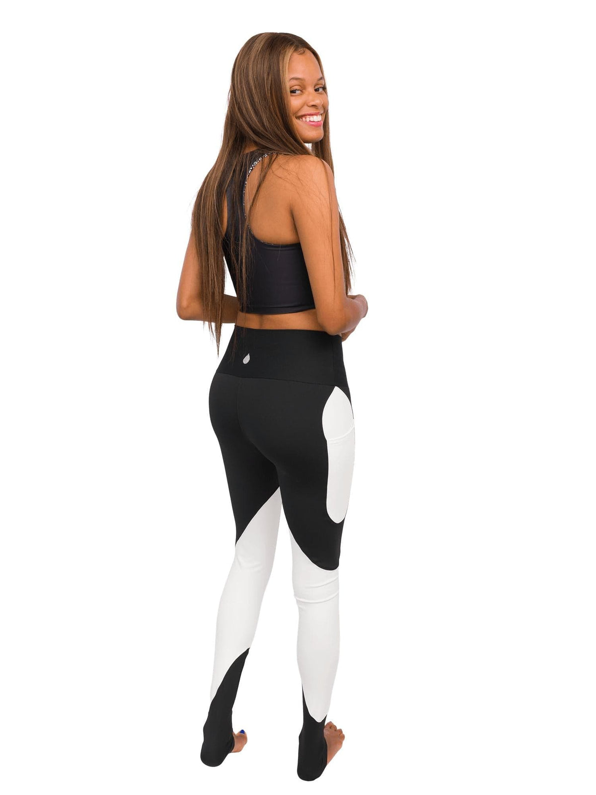 Model: Syriah is a sea turtle conservation biologist. She is 5&#39;7&quot;, 111 lbs and is wearing a size XS leggings with an XS spotted eagle ray top (reverse side).