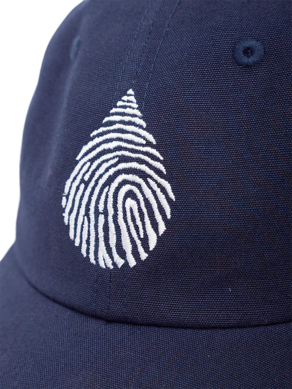 Close up view of the waterlust logo embroidered in white on a blue organic cotton dad cap hat