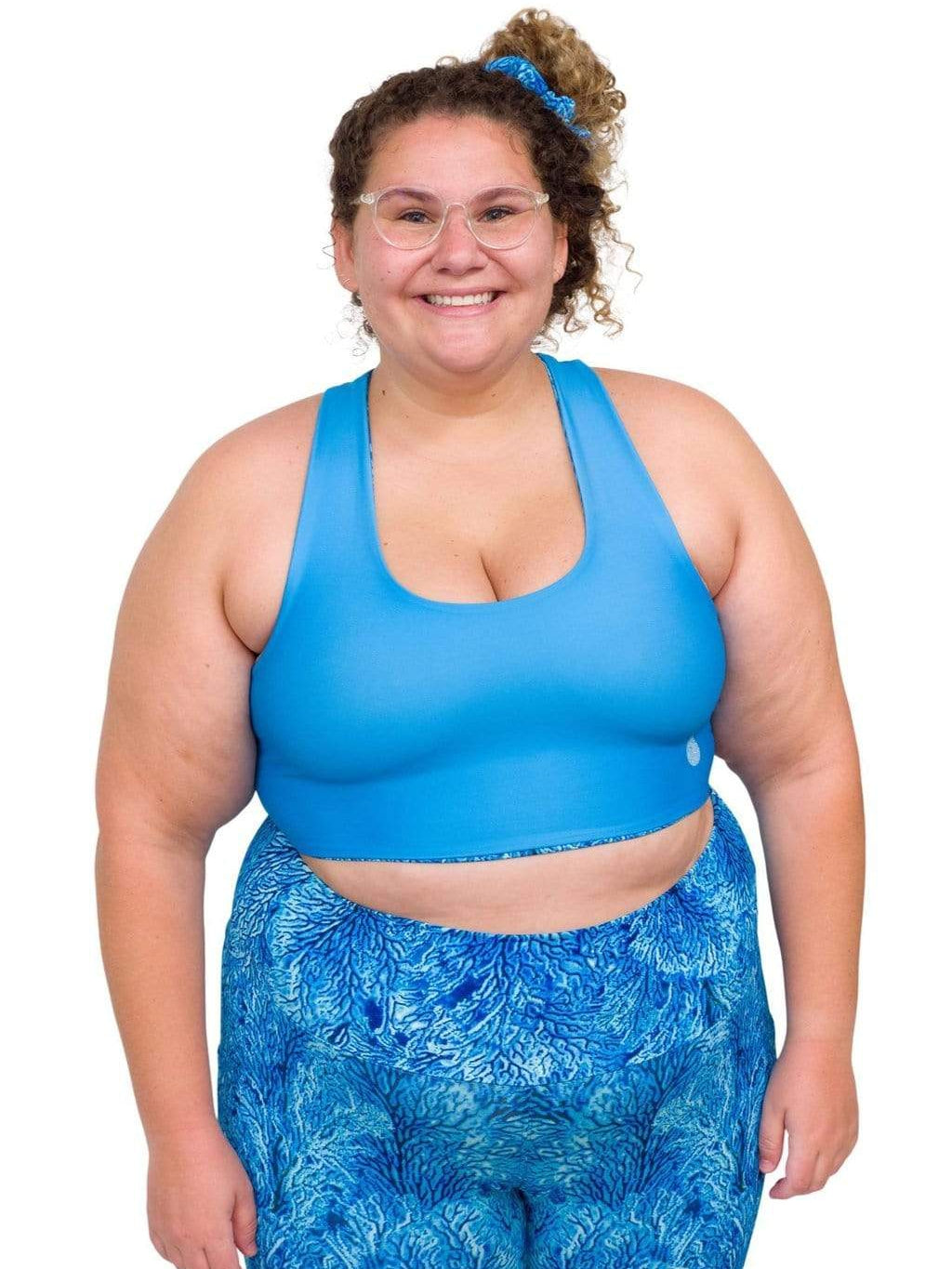 Model: Angela is working towards her Master of Professional Science in Marine Conservation. She is 5'6", 235 lbs, 42E and is wearing a 2XL top and legging.