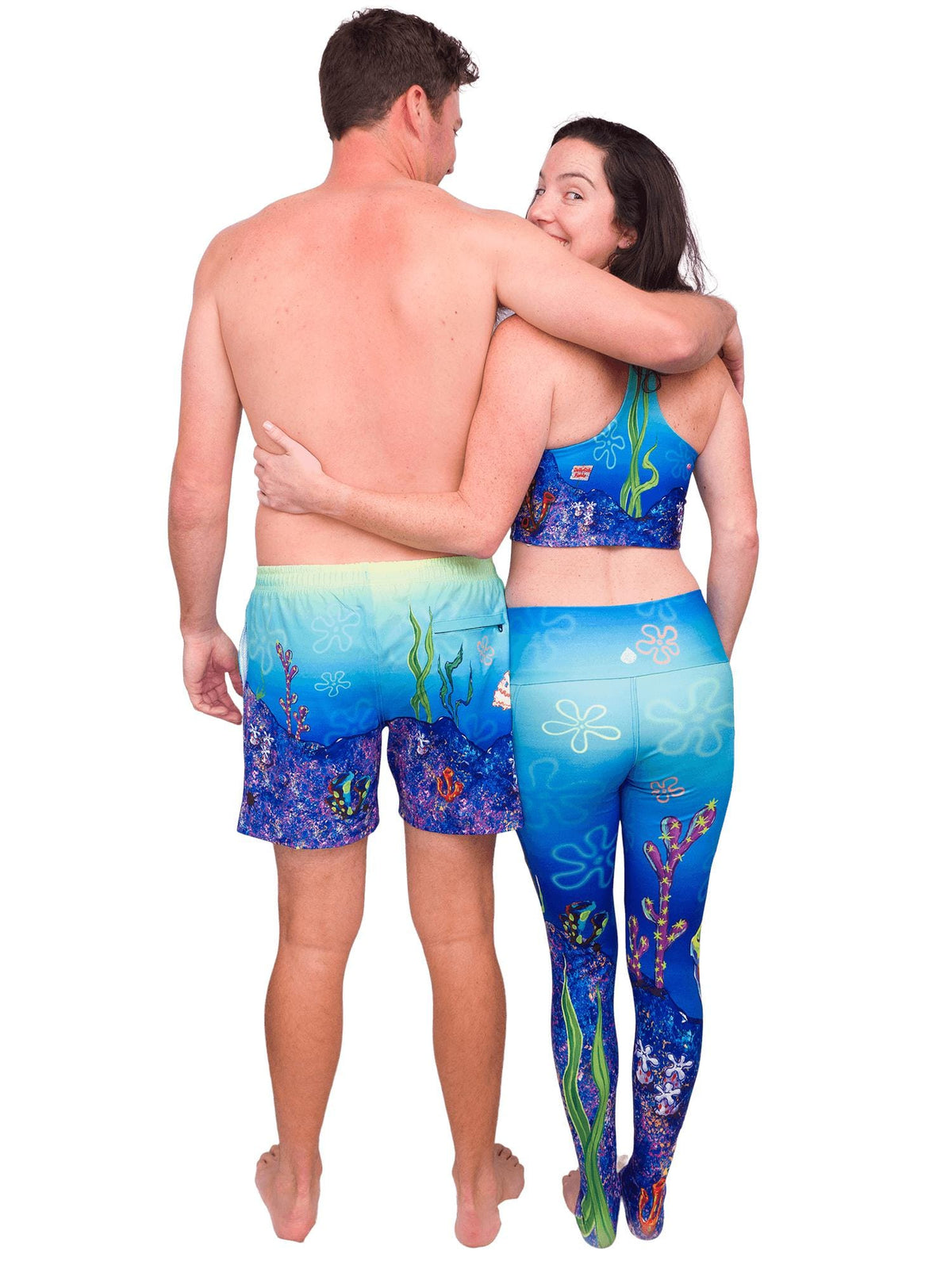 Model: Maddie is the Program &amp; Outreach Director at Debris Free Oceans and a restoration ecology educator. She is 5’8”, 135lbs, and wearing a M. Dalton is a coral biologist who studies the relationship between communities and reef ecosystems. He is 6’3”, 200lbs and is wearing a L.
