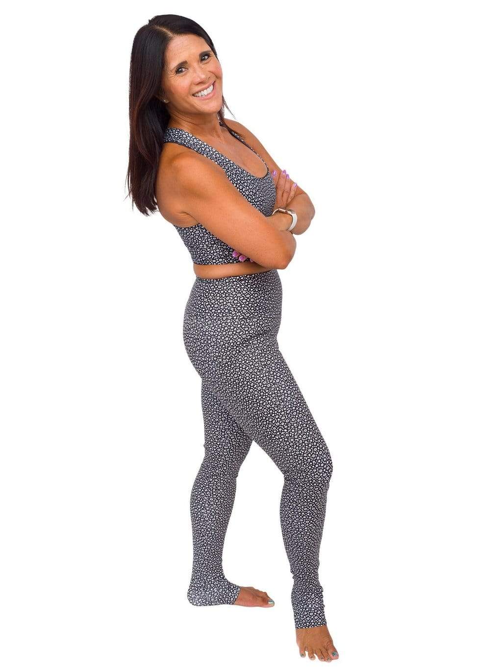 Model: Donna is a yoga teacher whose goal is to empower her students by using yoga to create deeper connections with themselves and with nature. She is 5&#39;2&quot;, 125 lbs, 34B and is wearing a S top and legging.