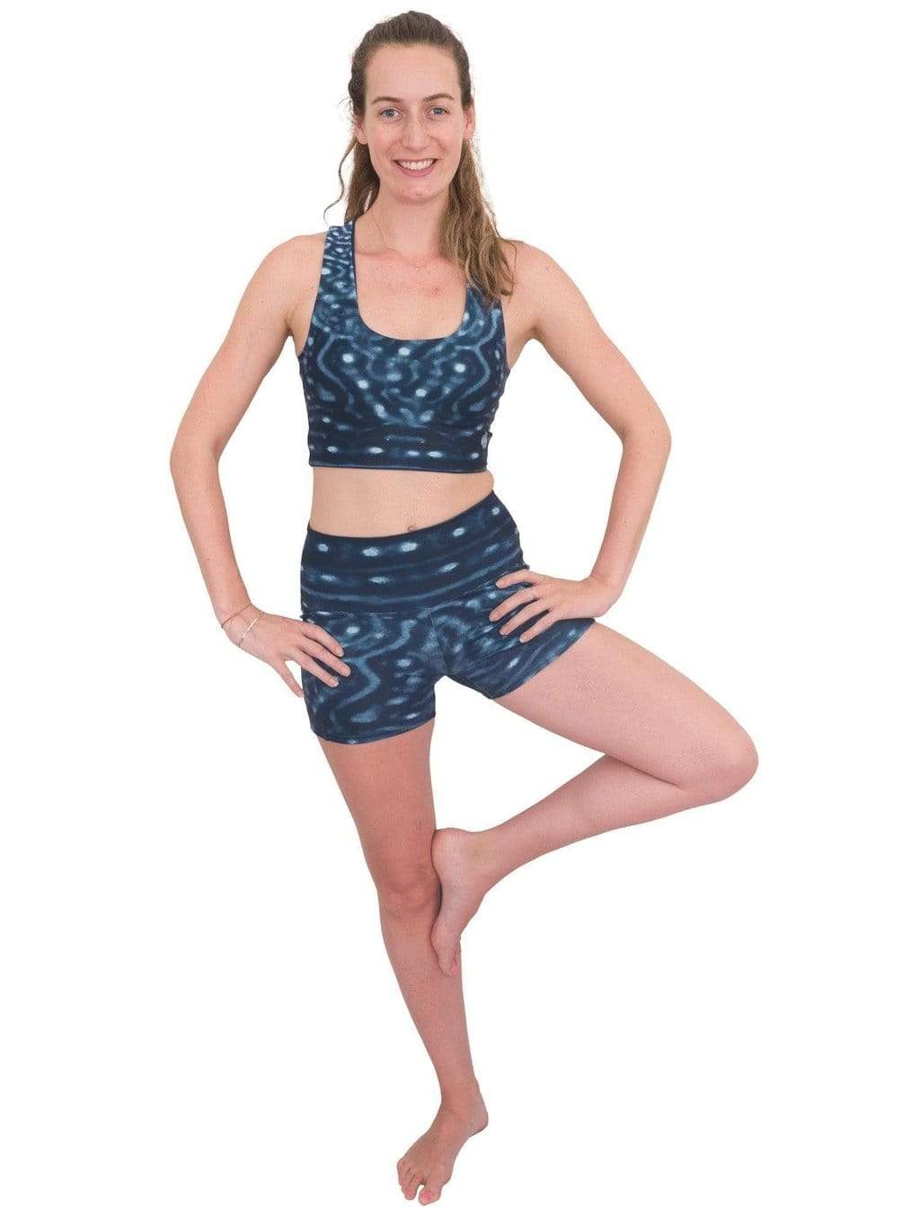 Model: Laura is our Chief Product Officer at Waterlust, a scuba diver, kiter and recreational yogi. She is 5’10, 147 lbs, 34B and is wearing a size S top and M short.