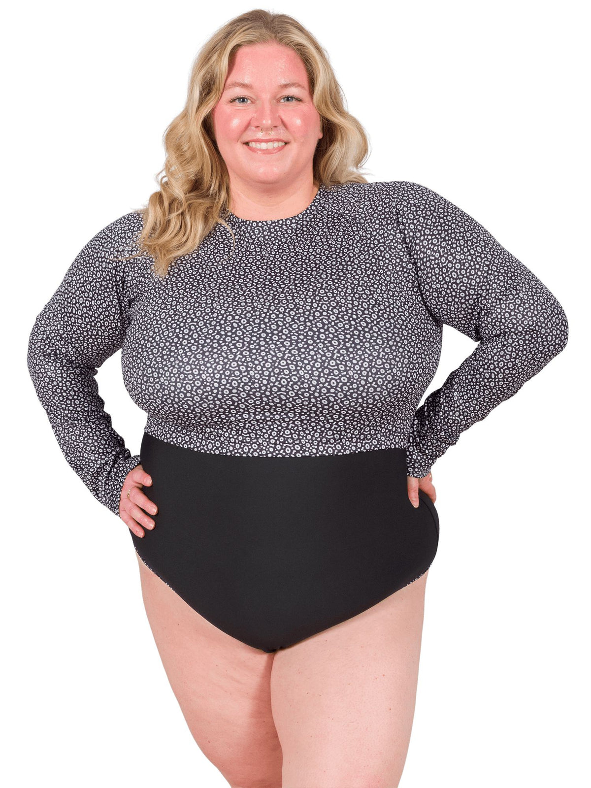 Model: Chelsea is a marine conservationist who believes that science is for everybody… and every BODY! She is 5&#39;2&quot;, 230 lbs, 42F, and is wearing a 2XL One-Piece Swimsuit with a 3XL Cropped Rashguard on top.