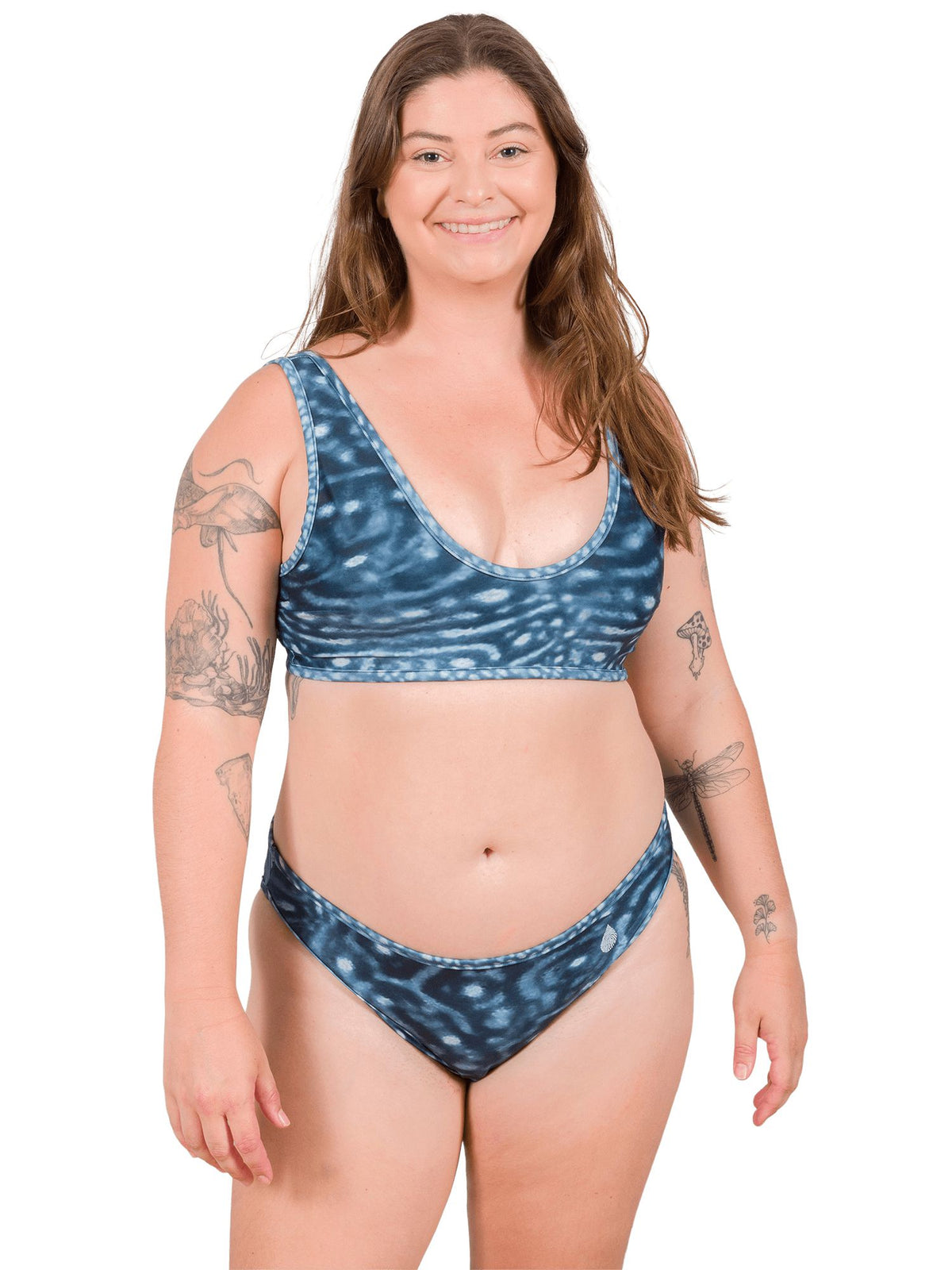 Model: Camilla is the Operations Manager here at Waterlust. She loves using her camera to communicate marine conservation issues. She is 5&#39;8&quot;, 195 lbs, 36D and is wearing an XL Classic Bikini Bottom and XL Scoop Bikini Top.