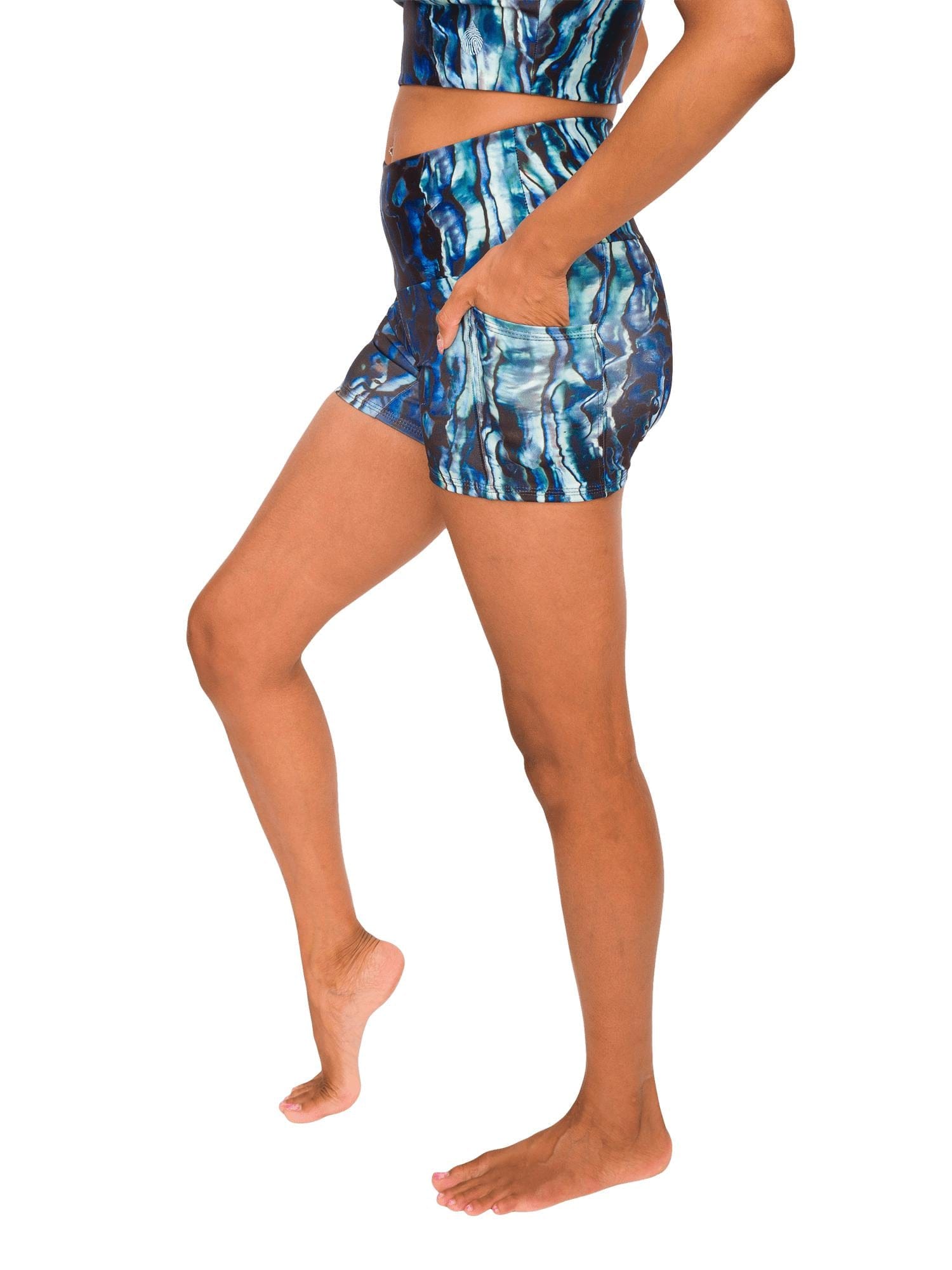 Model: Syriah is a sea turtle conservation biologist. She is 5'7", 130lbs and is wearing a size S shorts and S top. 