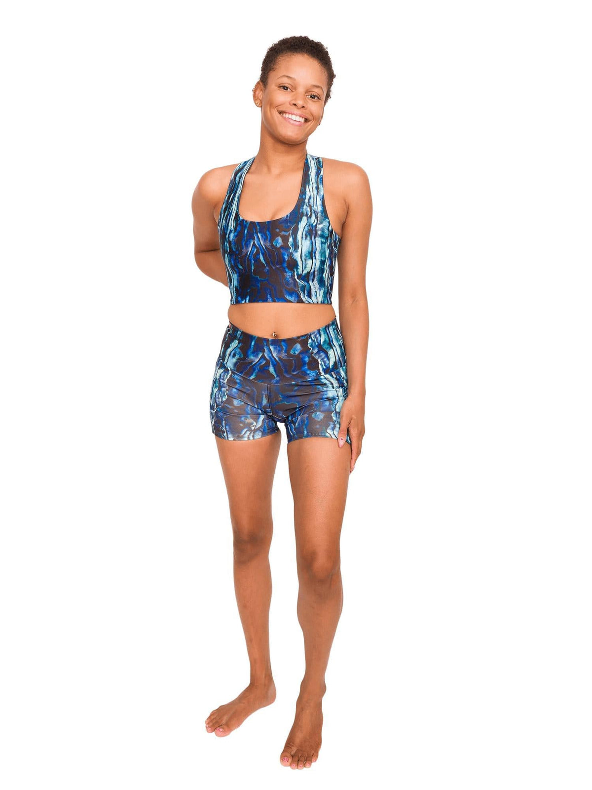 Model: Syriah is a sea turtle conservation biologist. She is 5&#39;7&quot;, 130lbs and is wearing a size S shorts and S top. 