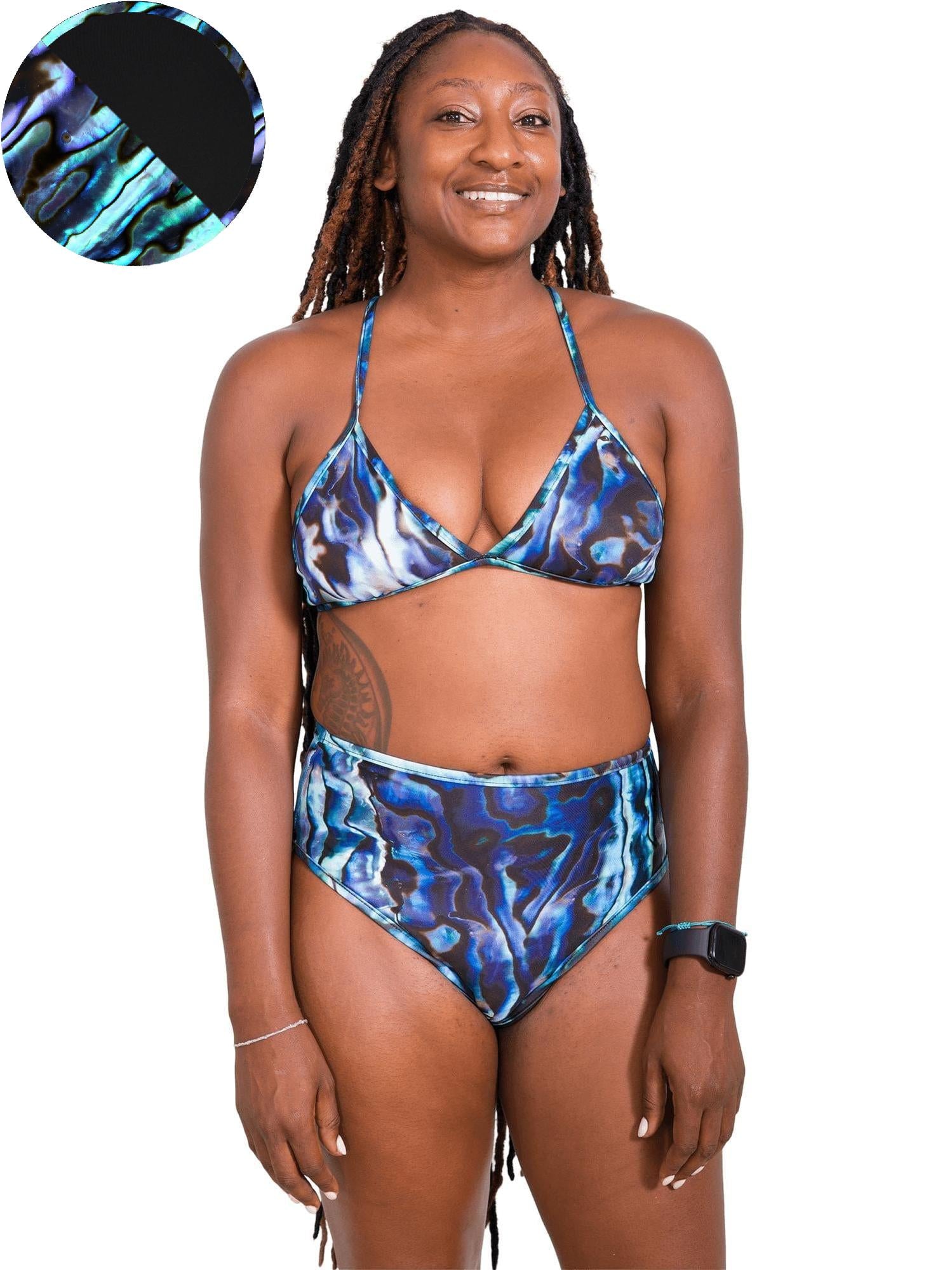 Model: Kayelyn is a marine biologist and underwater photographer. She is 5'4, 146 lbs, 34C and is wearing a size M.