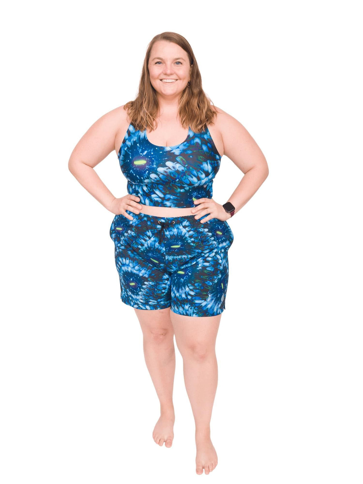 Model: Erin works to educate students and the community about conservation issues in South Florida. She is 5&#39;5&quot;, 225lbs, and wearing a size 3XL Short and 2XL Reversible Top. 