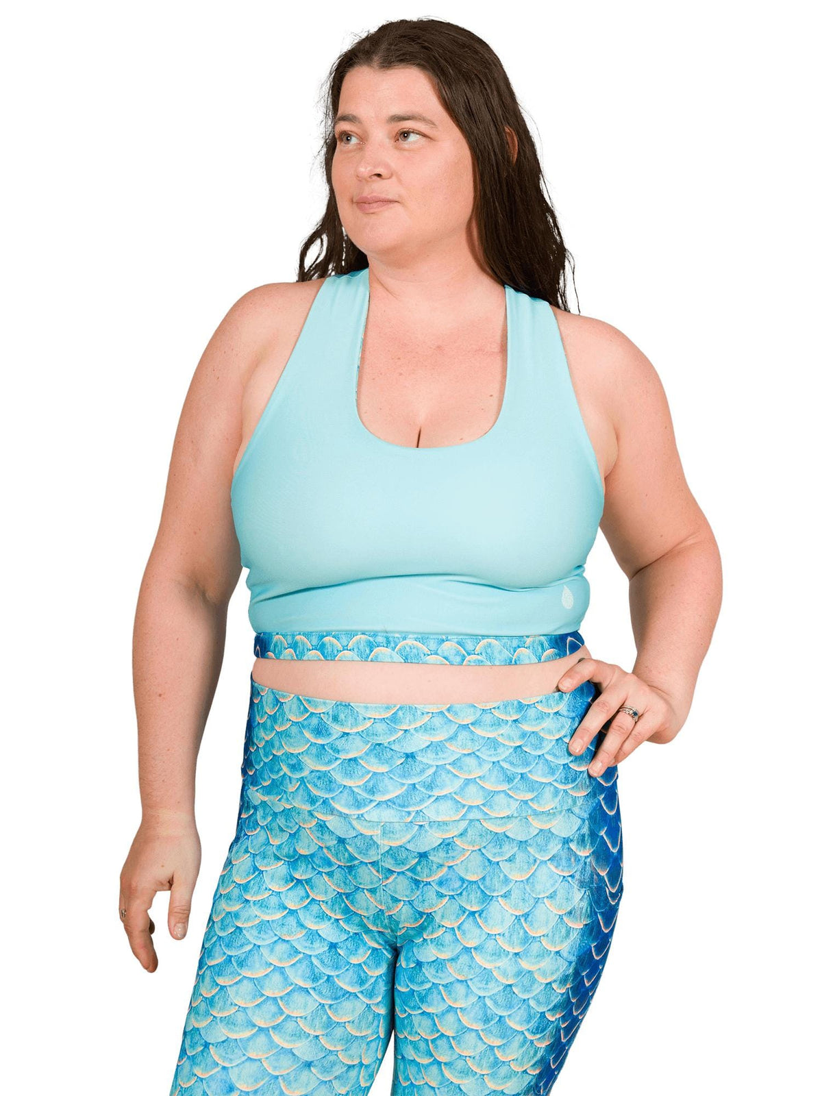 Model: Emily is a PhD Candidate in the Tropical Fish Ecology Lab at FIU. She’s been diving since she was little, and researches links between fish behavioral ecology and conservation. She is 5'10", 210lbs, 38H, and wearing a size 2XL reversible top and legging. 