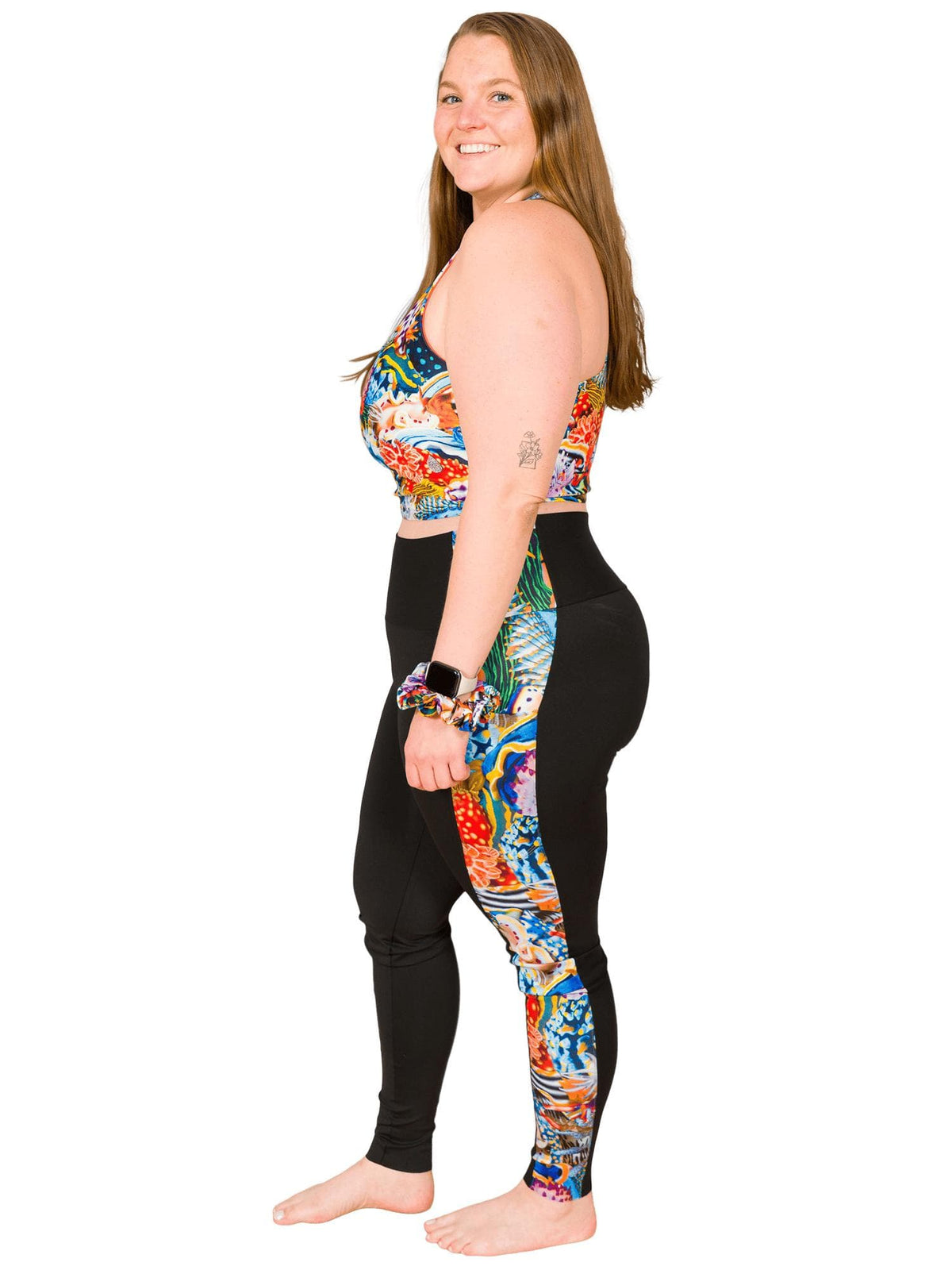 Model: Erin works to educate students and the community about conservation issues in South Florida. She is 5'5", 225lbs, and wearing a size 2XL.