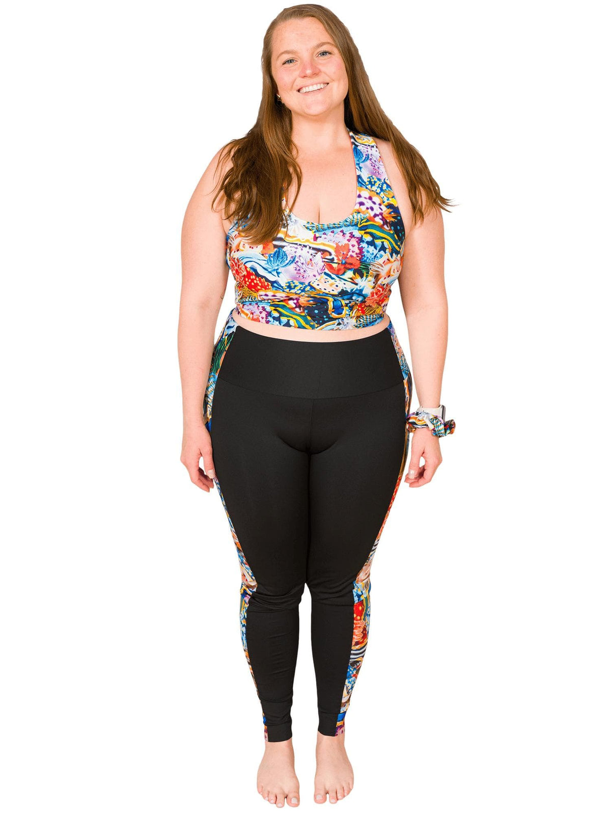 Model: Erin works to educate students and the community about conservation issues in South Florida. She is 5'5", 225lbs, and wearing a size 2XL.