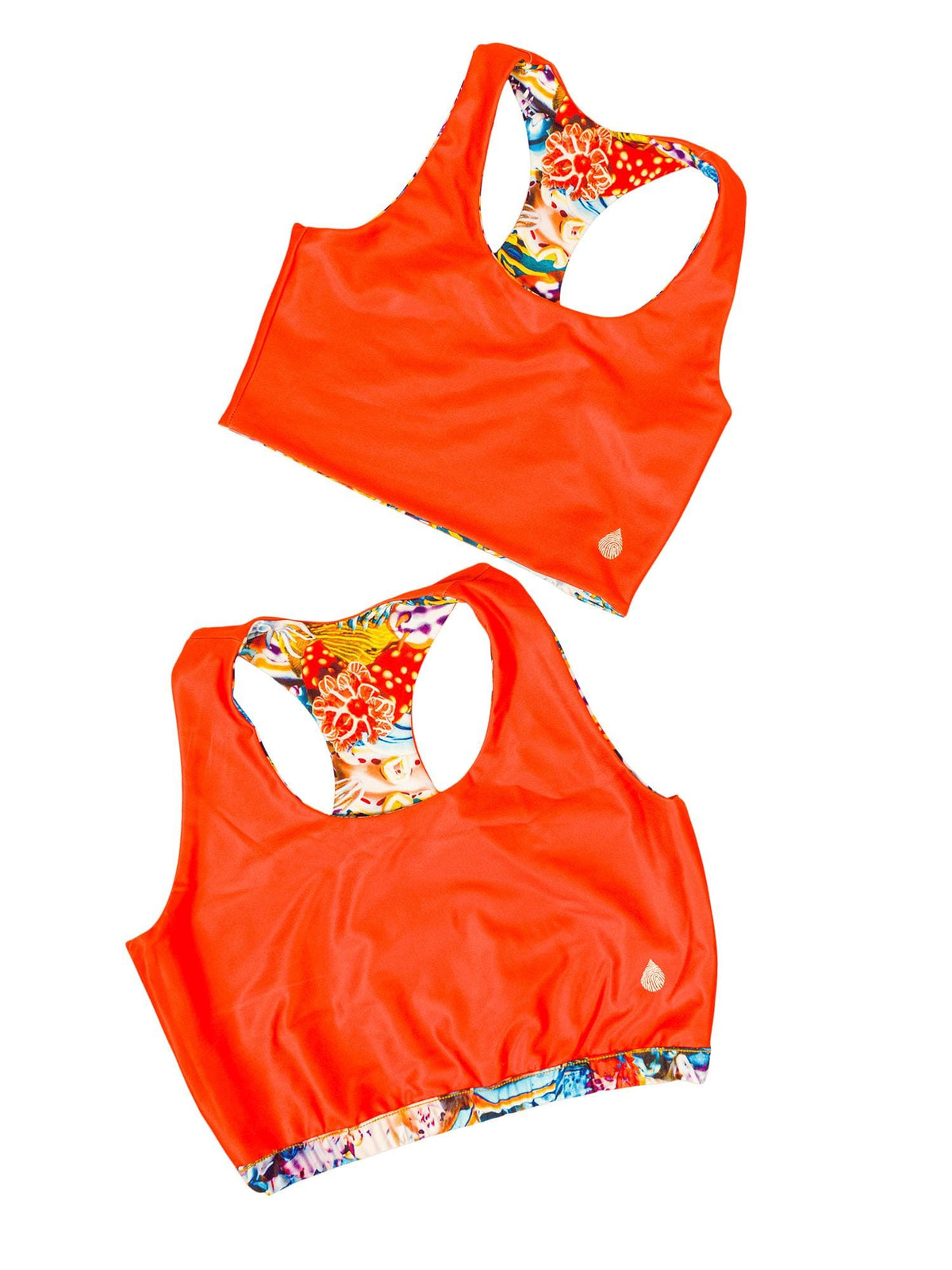 Model: Reverse solid color side. Sizes 2XL-3XL have extra elastic under the bust, slightly more side coverage, and wider straps for extra support and comfort.