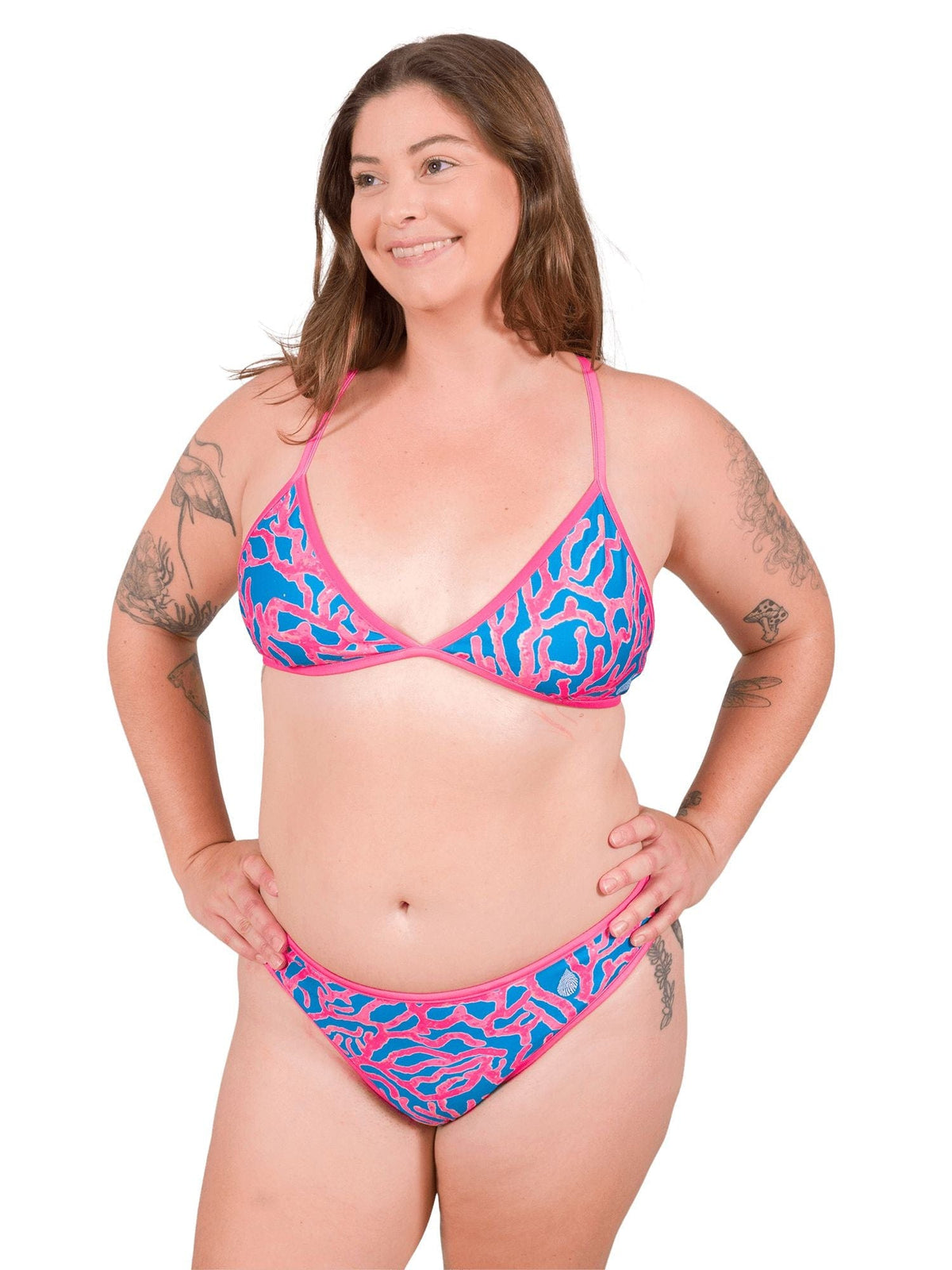 Model: Camilla is the Operations Manager here at Waterlust. She loves using her camera to communicate marine conservation issues. She is 5&#39;8&quot;, 195 lbs, 36D and is wearing an XL String Bikini Top and XL Classic Bikini Bottom.