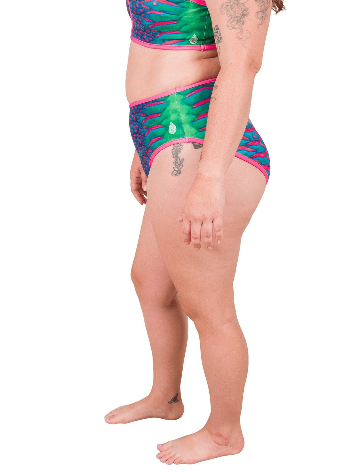 Model: Camilla is the Operations Manager here at Waterlust. She loves using her camera to communicate marine conservation issues. She is 5&#39;8&quot;, 195 lbs and wearing a size XL High-Waisted Bikini Bottom.