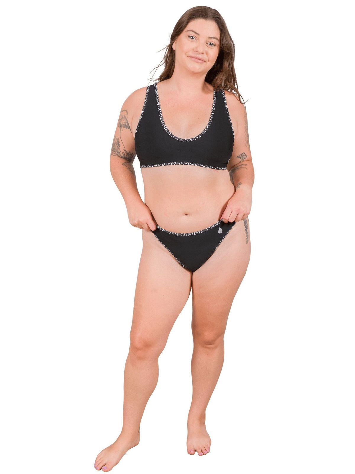 Model: Camilla is the Operations Manager here at Waterlust. She loves using her camera to communicate marine conservation issues. She is 5&#39;8&quot;, 195 lbs, 36D and is wearing an XL Classic Bikini Bottom and XL Scoop Bikini Top.