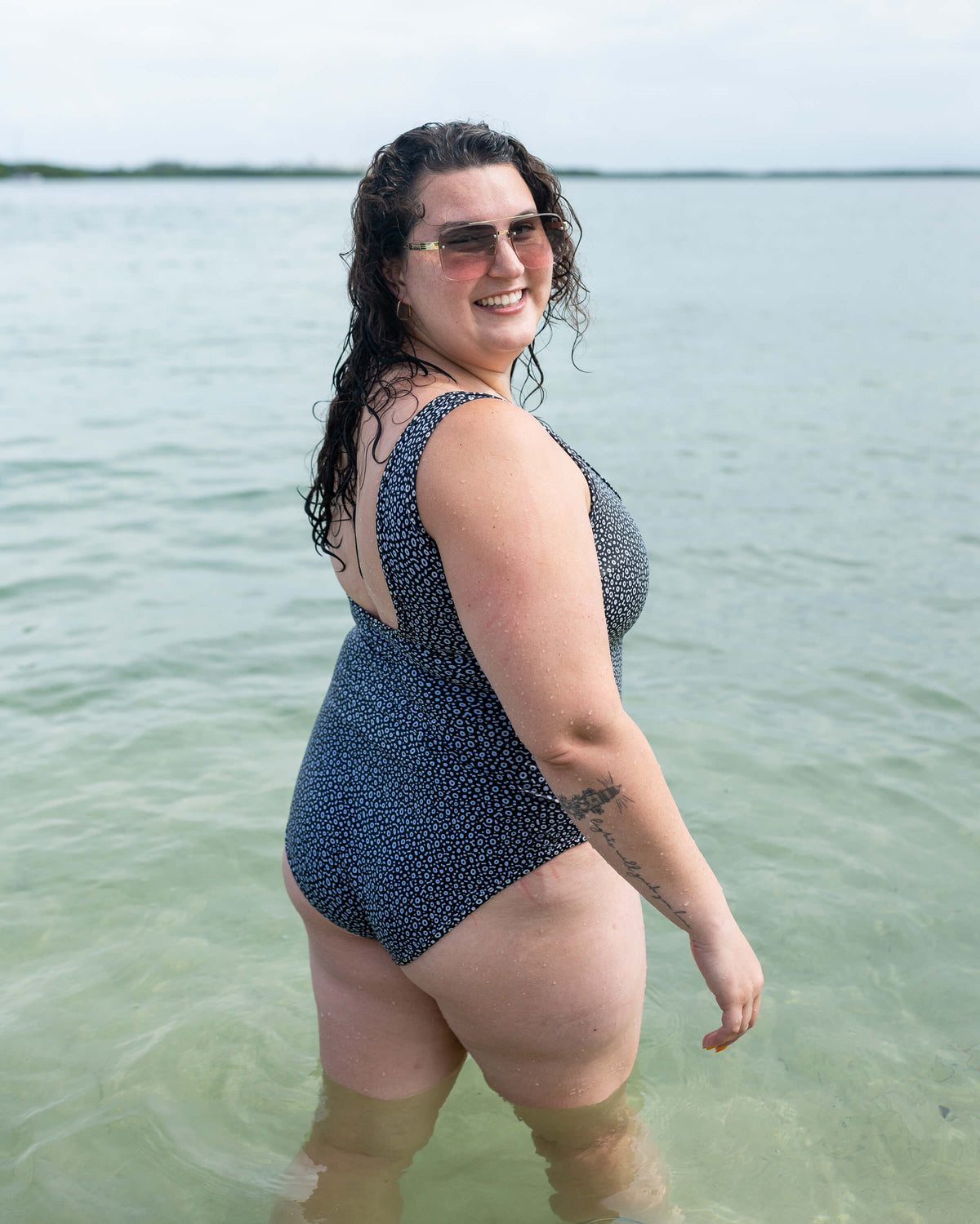 Model: Kela is a marine conservationist who strives to connect students with educational opportunities to help expand the reach of the marine science field. She is 5’5”, 185 lbs, 36F and is wearing a size L One-Piece Swimsuit.