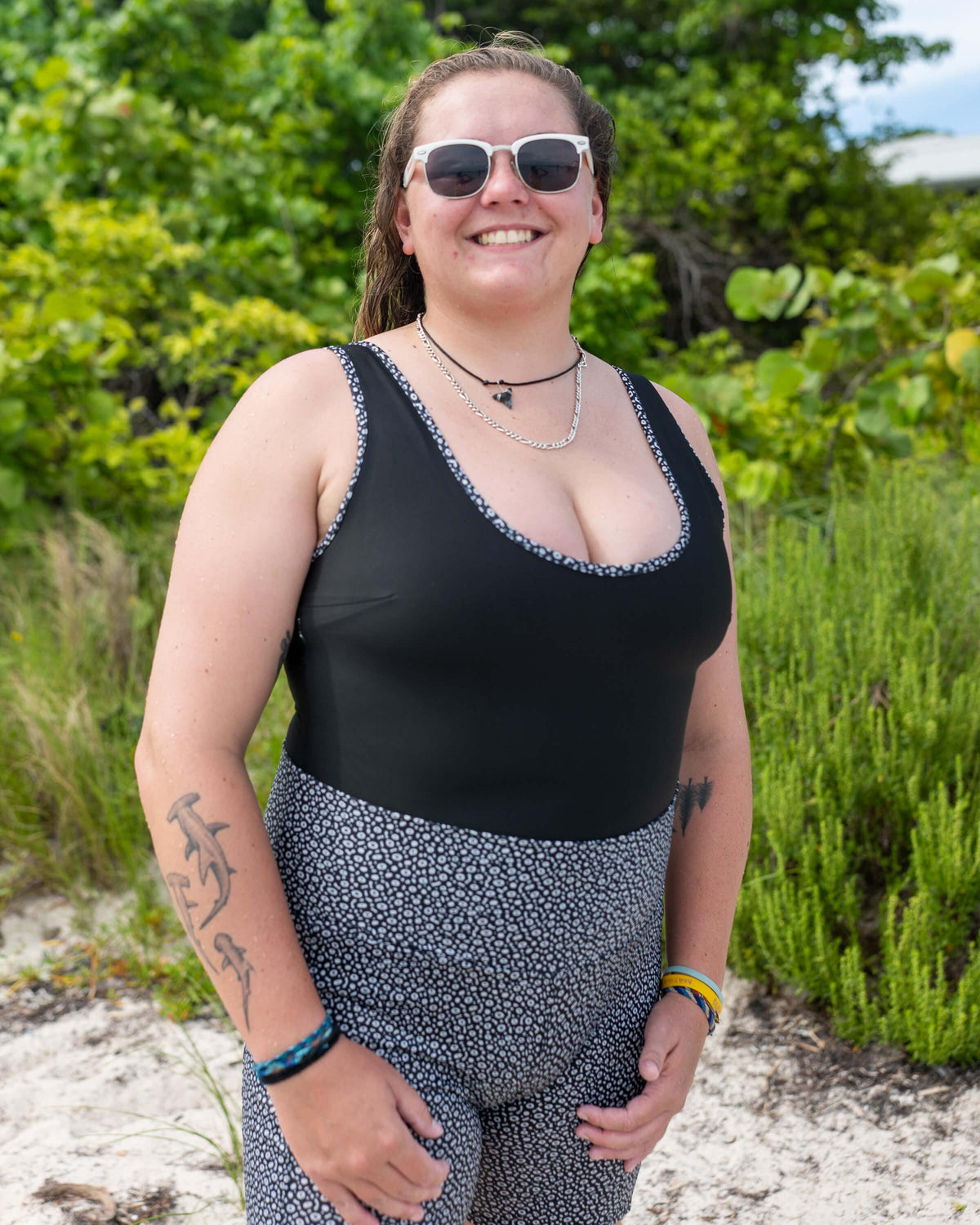 Model: Jenny is a Masters student researching the movement and habitat use of the Atlantic Guitarfish using acoutic telemetry. She is 5&#39;9&quot;, 185 lbs, 36D and wearing an XL One-Piece Swimsuit and XL 8 inch Shorts.