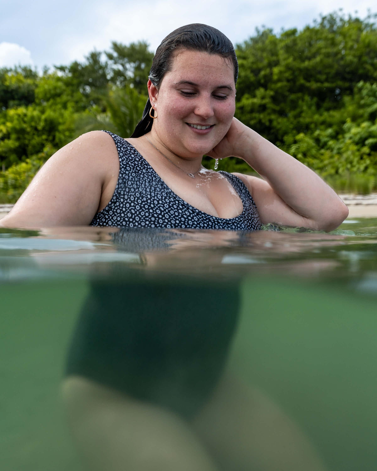 Model: Kela is a marine conservationist who strives to connect students with educational opportunities to help expand the reach of the marine science field. She is 5’5”, 185 lbs, 36F and is wearing a size L One-Piece Swimsuit.