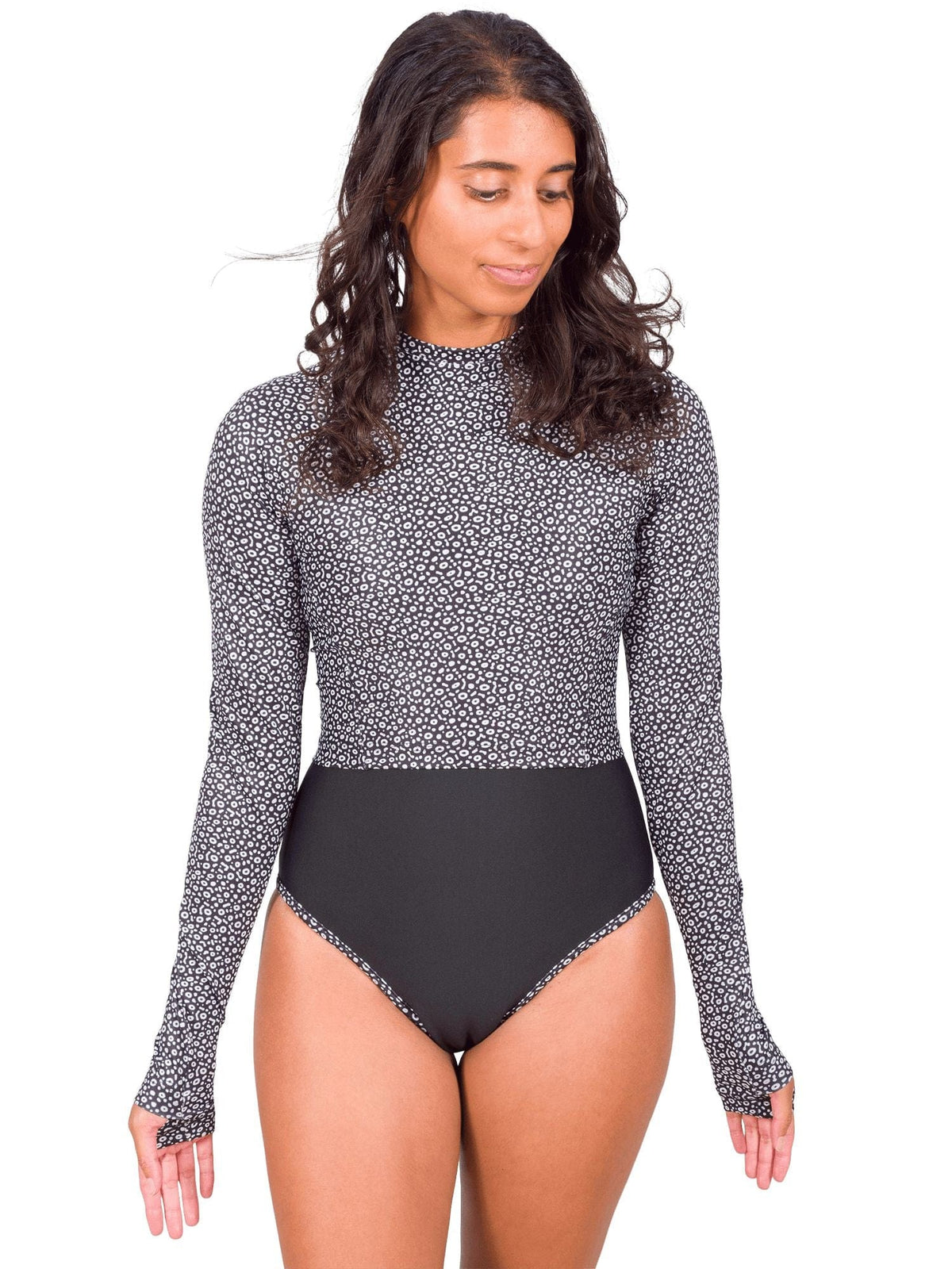 Model: Michelle is a marine science educator, coral reef ecologist, and scientific diver. She is 5&#39;3&quot;, 111lbs, 32A and is wearing a size XS One-Piece Swimsuit with a S Cropped Rashgaurd on top.