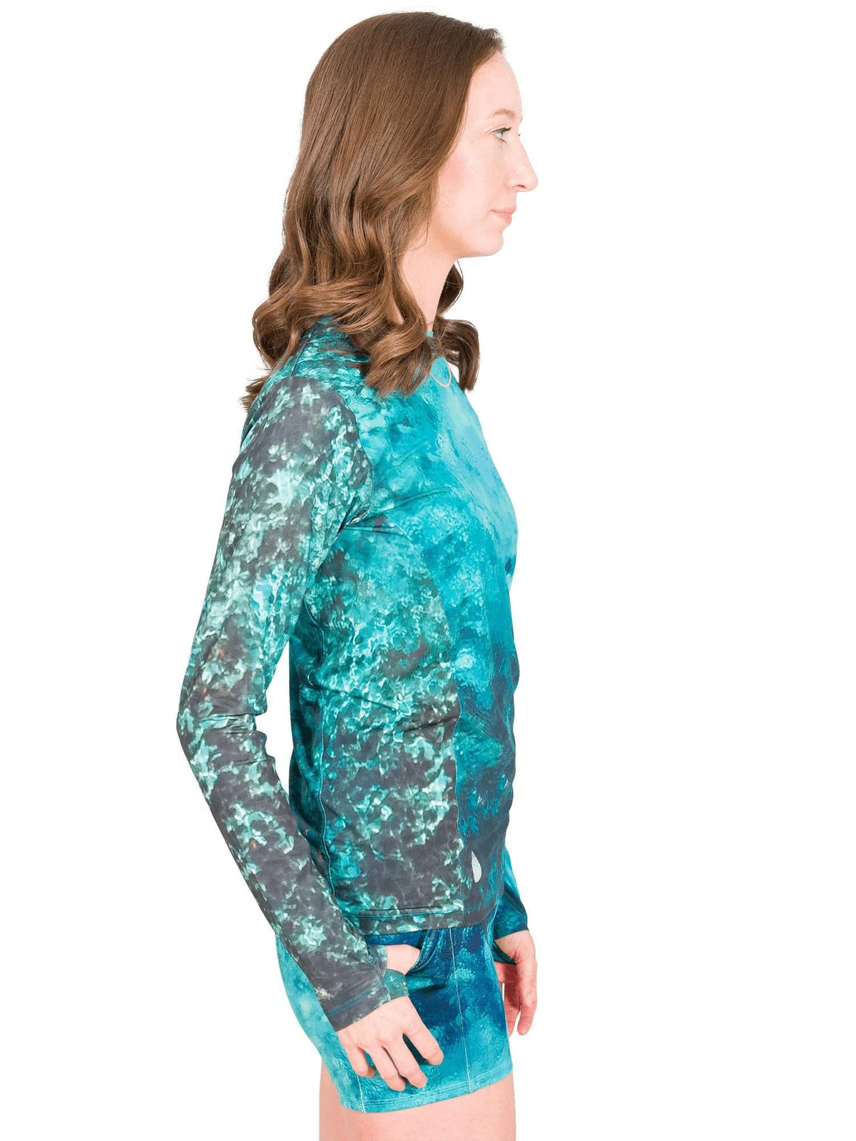Katherine is a marine biologist and environmental scientist. She is 5&#39;8&quot;, 120 lbs, 32B and is wearing a size XS Women&#39;s Crew Neck Sun Shirt and S shorts.