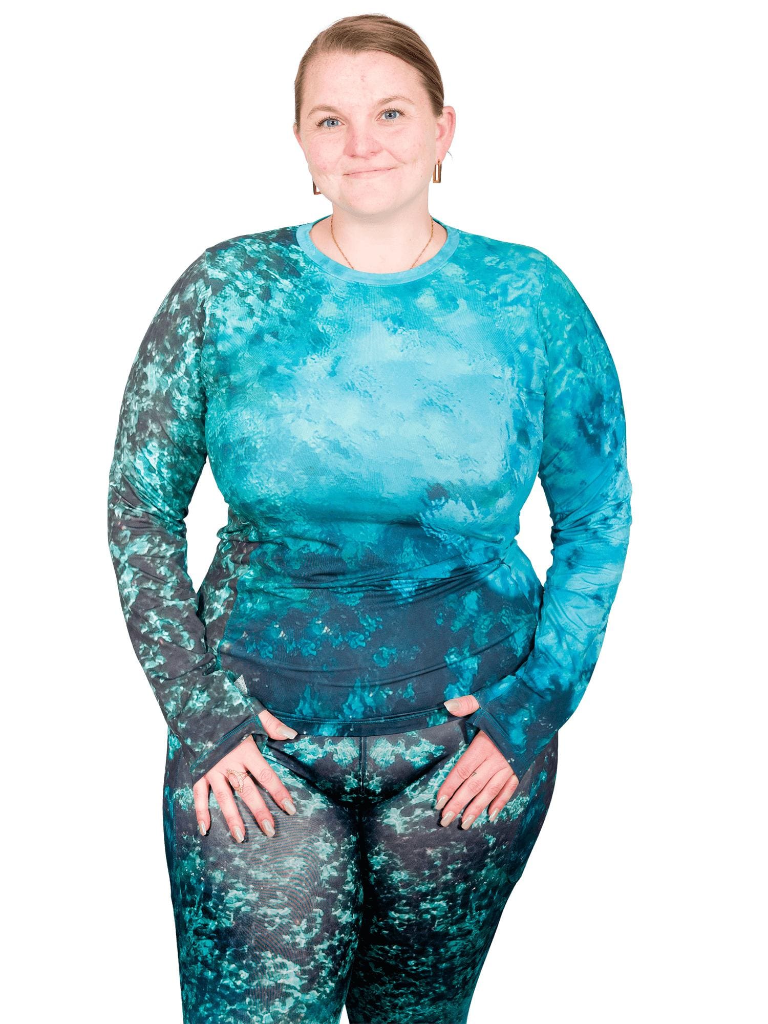 Model: Erin works to educate students and the community about conservation issues in South Florida. She is 5'5", 225lbs, and is wearing a XL Women's Crew Neck Sun Shirt a 3XL legging.