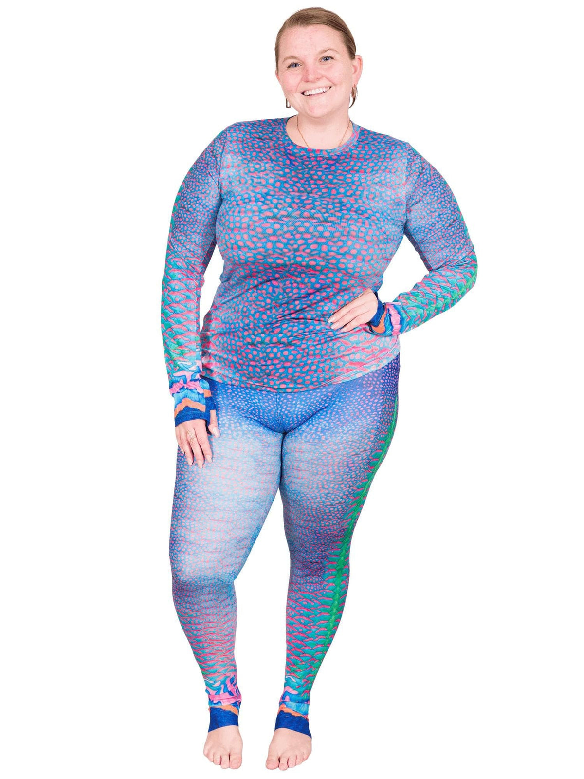 Model: Erin works to educate students and the community about conservation issues in South Florida. She is 5&#39;5&quot;, 225lbs, and  is wearing a XL Women&#39;s Crew Neck Sun Shirt with a 3XL legging.