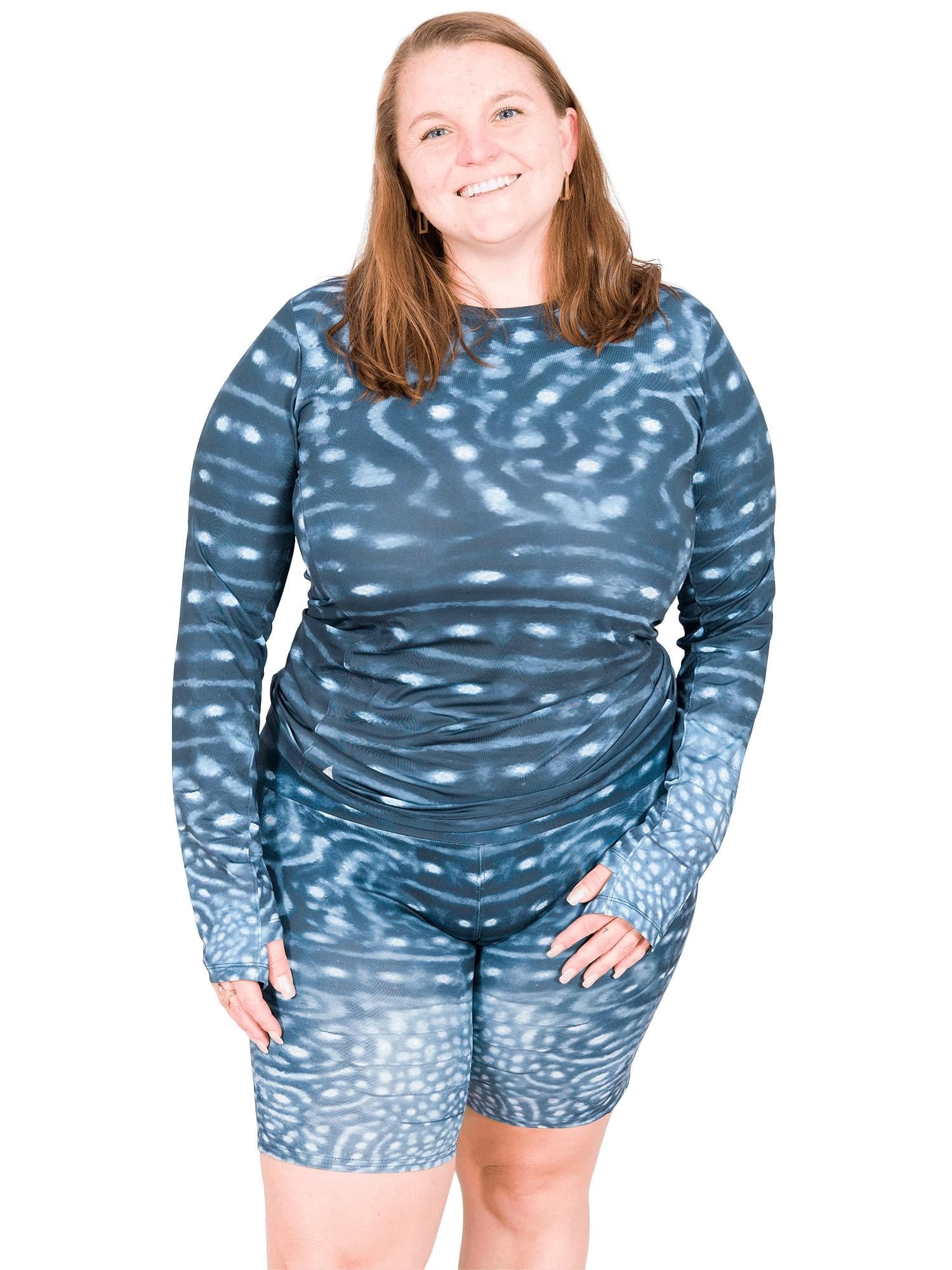 Model: Erin works to educate students and the community about conservation issues in South Florida. She is 5'5", 225lbs, and  is wearing a XL Women's Crew Neck Sun Shirt with a 3XL short.
