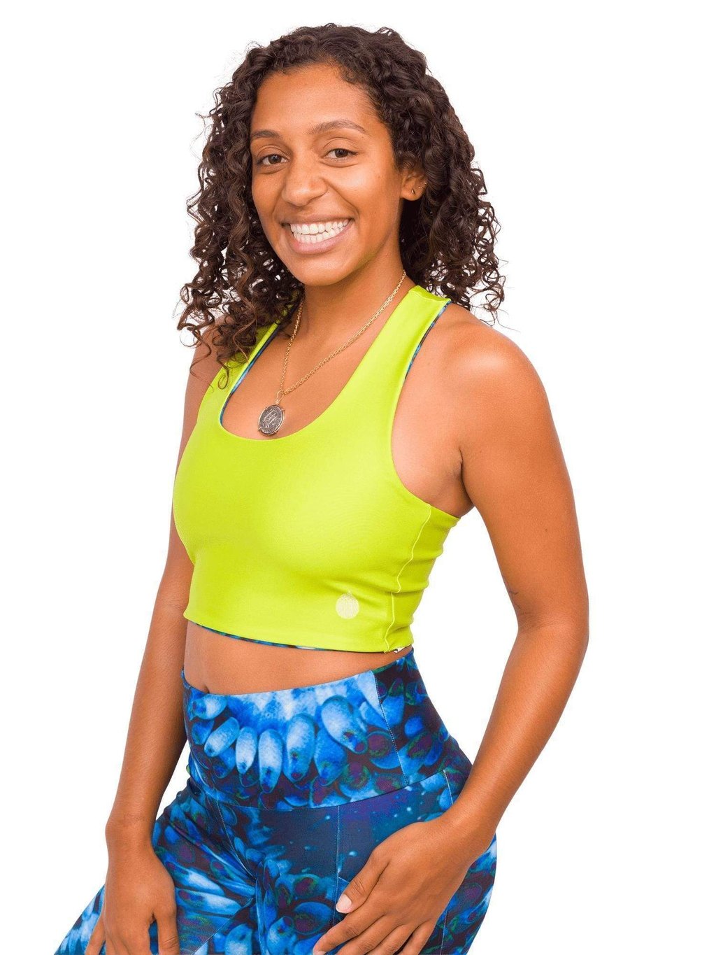 Model: Gabrielle works in coral reef restoration and strives to end single-use plastic in her daily routine. She is 5&#39;4&quot;, 135lbs, 34C and is wearing a M top and M shorts.