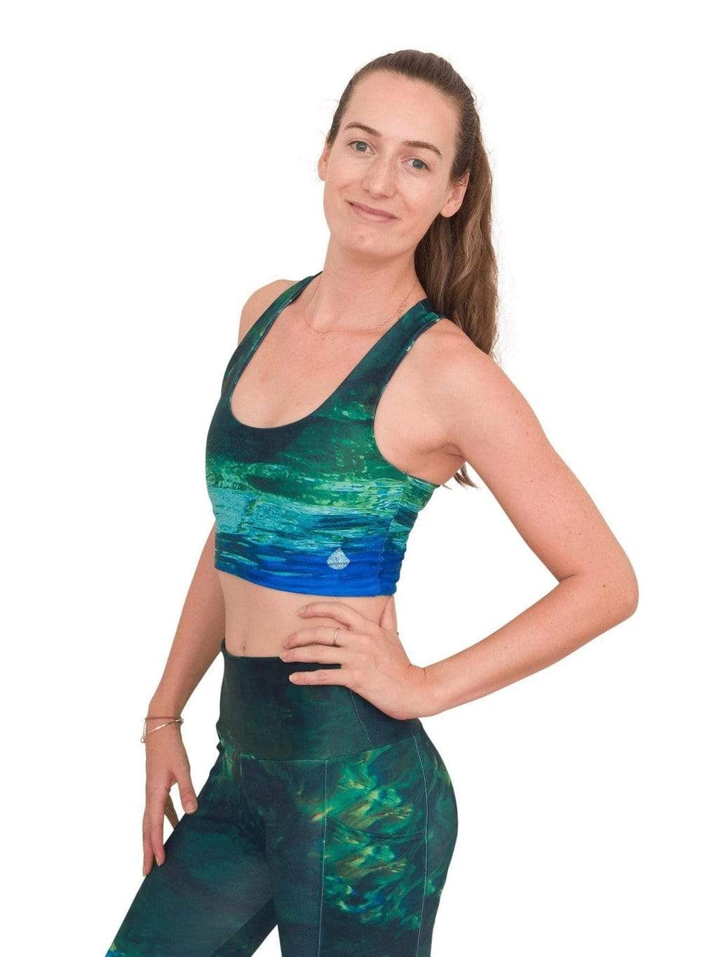 Model: Laura is our Chief Product Officer at Waterlust, a scuba diver, kiter and recreational yogi. She is 5’10, 147 lbs, 34B and is wearing a size S top and M legging.