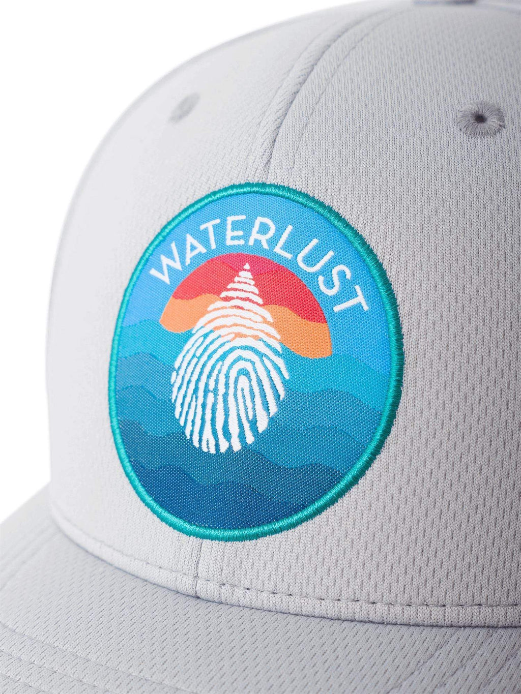 Close up view of the front of a gray full fabric hat with a waterlust logo patch showing a sunset over water.