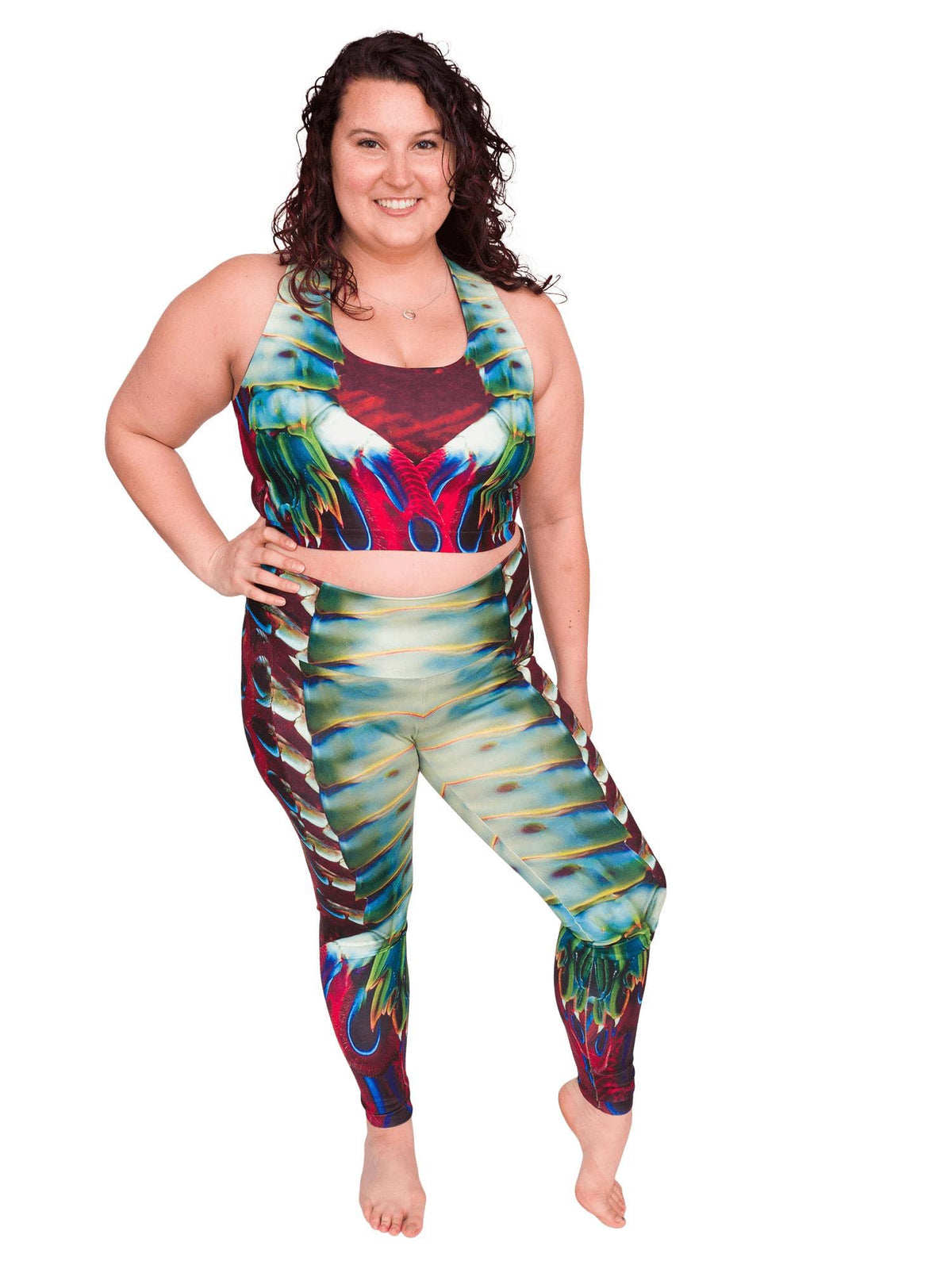 Model: Kela is a marine conservationist who strives to connect students with educational opportunities to help expand the reach of the marine science field. She is 5’5”, 185 lbs, 36F and is wearing a size XL top and legging.