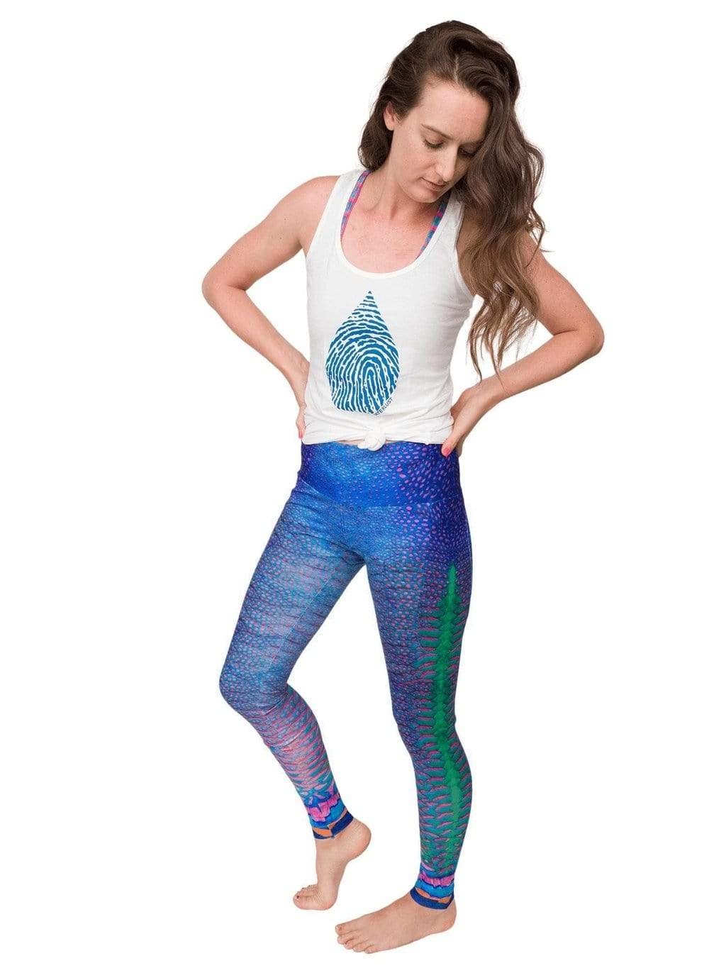Model: Laura is our Chief Product Officer at Waterlust, a scuba diver, kiter and recreational yogi. She is 5’10, 147 lbs, 34B and is wearing a size M tank and M legging.