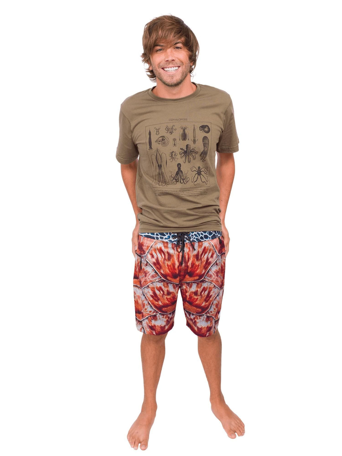 Model: Dan is a sea turtle monitor with Sea Turtle Adventures. He is 5’10, 140 lbs and is wearing a size 31 boardshort and M tee.