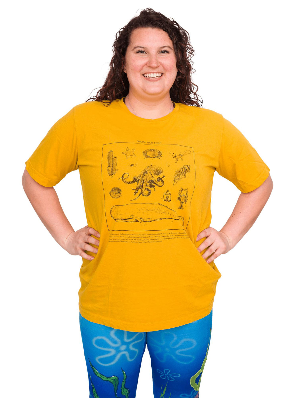 Model: Kela is a marine conservationist who strives to connect students with educational opportunities to help expand the reach of the marine science field. She is 5’5”, 185 lbs, 36F and is wearing a size L tee and XL legging.