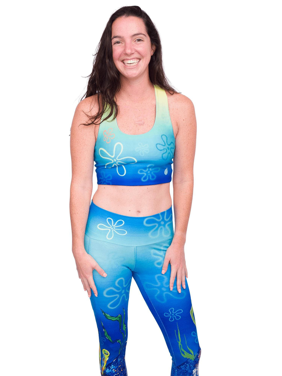 Model: Maddie is the Program &amp; Outreach Director at Debris Free Oceans and a restoration ecology educator. She is 5’8”, 135lbs, and wearing a size M legging and top.