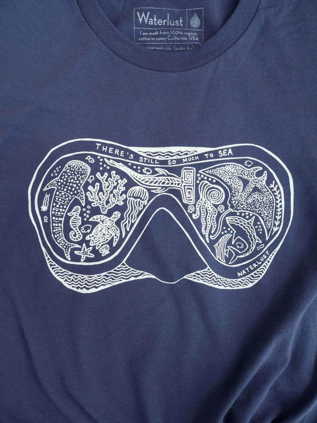 Waterlust "There's Still So Much To Sea" 100% Organic Cotton Tee Shirt - flat off body view of front