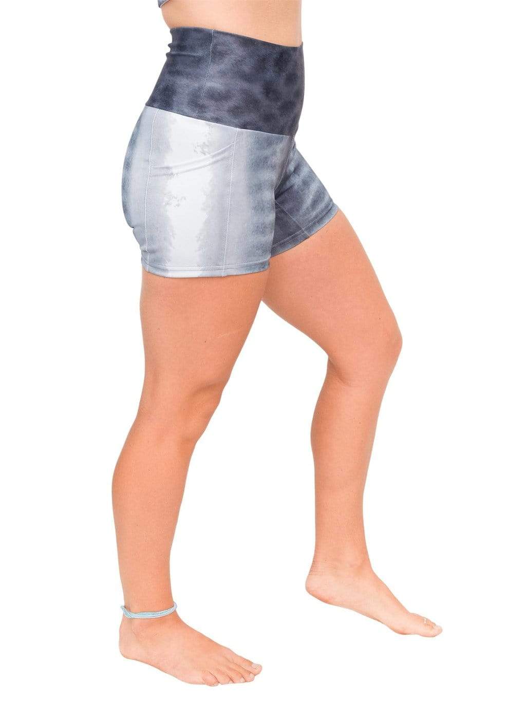 Model: Erin is a coral ecologist and Program Manager here at Waterlust. She 4'11", 110 lbs, 32A and is wearing an XS short.