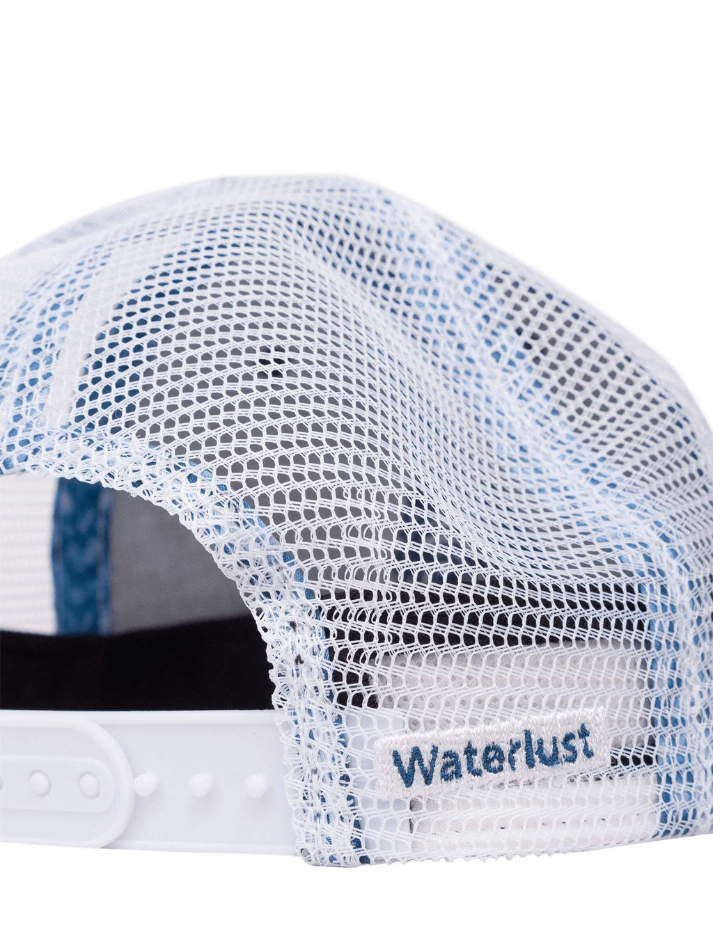 Close up view of the waterlust name embroidered on the back of a white mesh whale shark printed trucker cap hat