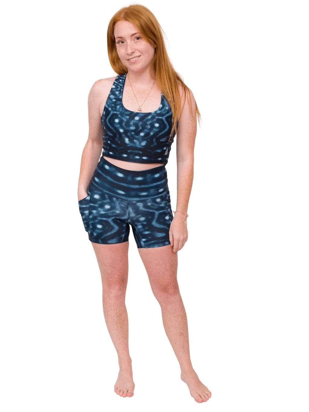Model: Meggan is working on a masters degree in marine science and has worked as a coral scientist. She is 5&#39;1&quot;, 105 lbs, 32A and is wearing an XS top and XS short.