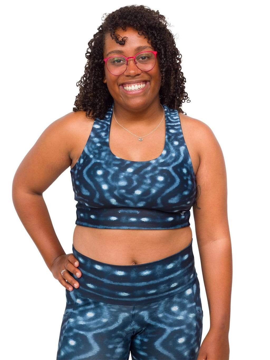 Model: Amani is the CFO of Minorities in Shark Sciences and a shark scientist. She is 5&#39;3&quot;, 160 lbs, 36C and is wearing a M legging and L top.