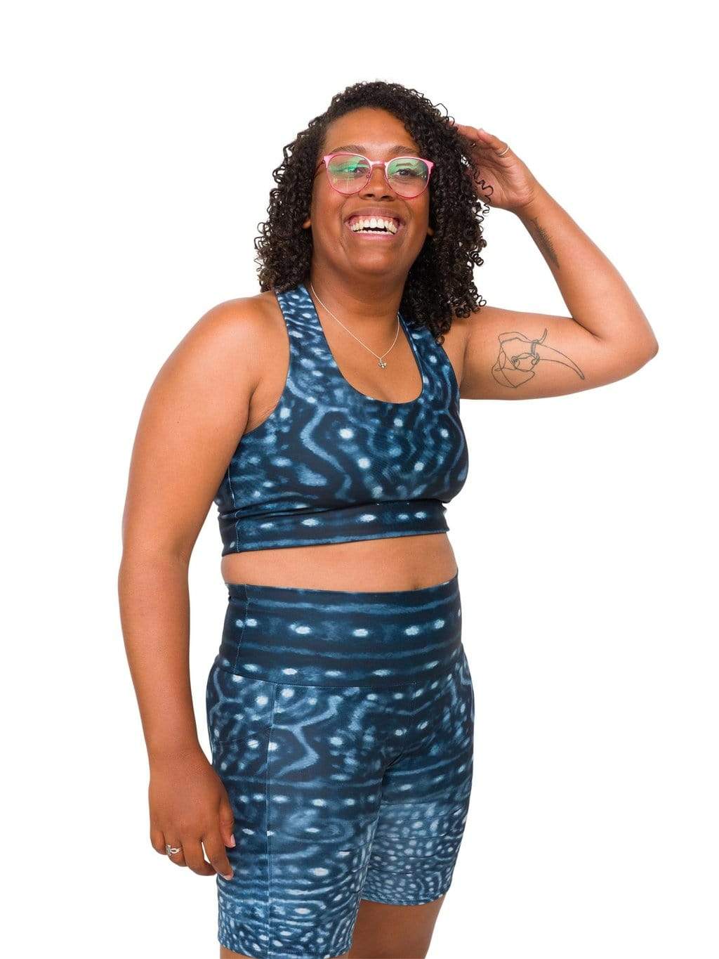 Model: Amani is the CFO of Minorities in Shark Sciences and a shark scientist. She is 5&#39;3&quot;, 160 lbs, 36C and is wearing a M legging and L top.