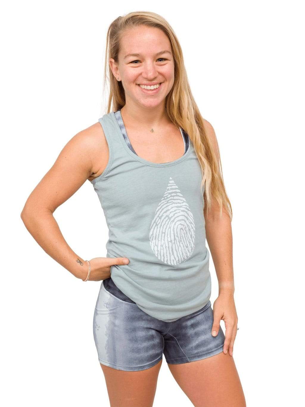 Model: Erin is a coral ecologist and Program Manager here at Waterlust. She 4&#39;11&quot;, 110 lbs, 32A and is wearing an XS short and XS tank.